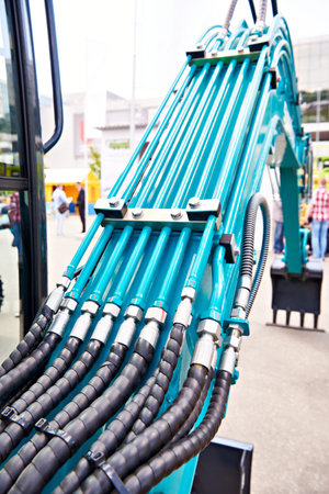 Hydraulic hoses on an industrial machine
