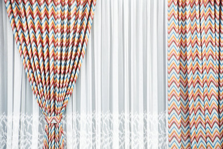 Curtains with print for windowの写真素材