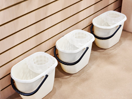 Plastic bucket for cleaning floors in storeの写真素材
