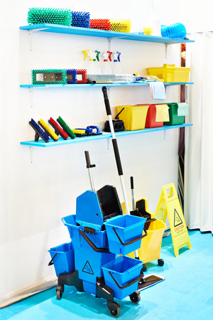 Cleaning trolleys, brushes and buckets in store exhibitionの写真素材