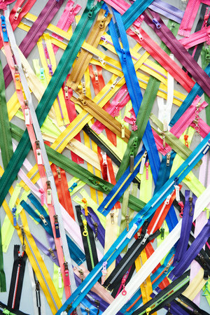 Zippers background for clothes at the exhibition