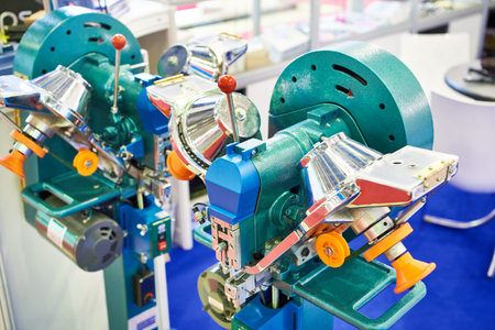 Industrial fastening machine for making rivets and buttons