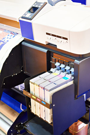 Ink in cartridges and plotter on fabric and paper