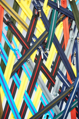Zippers background for clothes at the exhibition