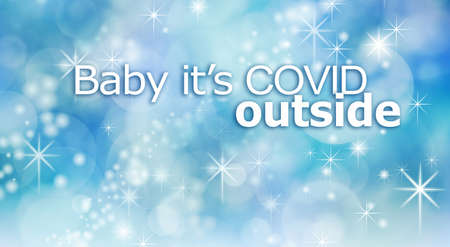 Baby itâs COVID outside concept background - pale blue wintery sparkling cool background with the words Baby itâs covid outsideの写真素材