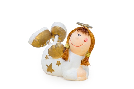 Ceramic angel figurine girl on a white backgroundの写真素材