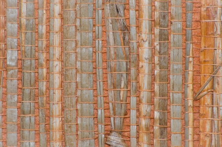Woven pattern background with bamboo and grassの写真素材