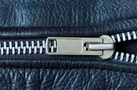 Black Leather jacket zipper close upの写真素材
