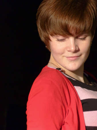 Young pregnant girl is walking around the cityの写真素材