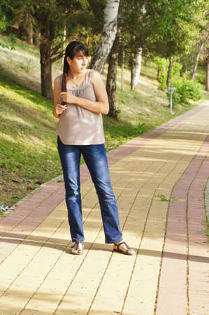 young girl on a walkの写真素材