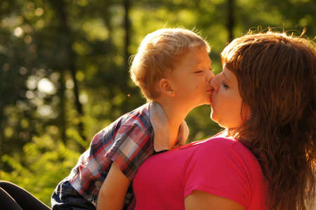 The little boy with mum on walkの写真素材