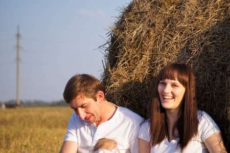 Young happy family on walkの写真素材