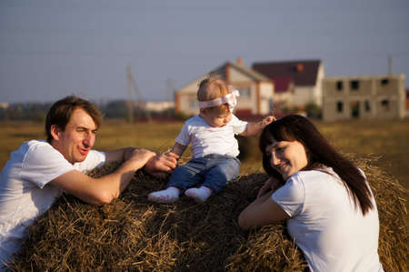 Young happy family on walkの写真素材