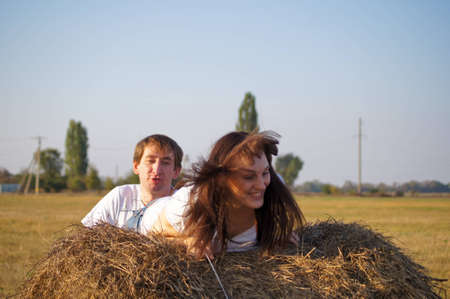 Happy young pair on walkの写真素材