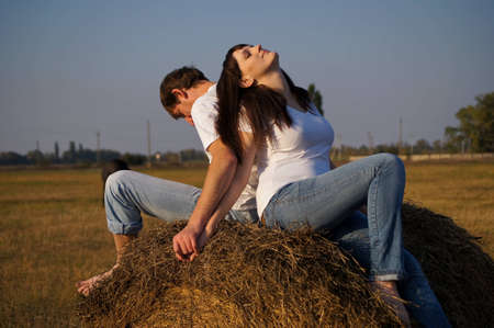 Happy young pair on walkの写真素材