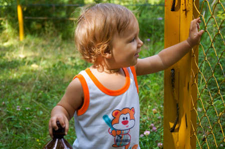 The amusing little boy on walkの写真素材