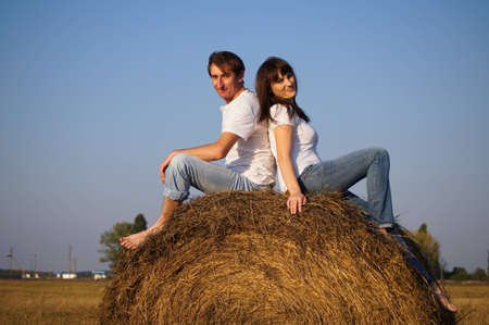 Happy young pair on walkの写真素材