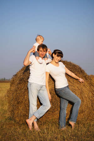 Young happy family on walkの写真素材