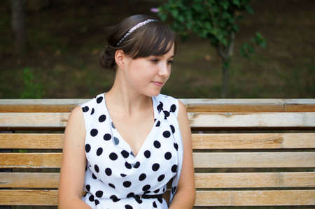 young girl sittingの写真素材