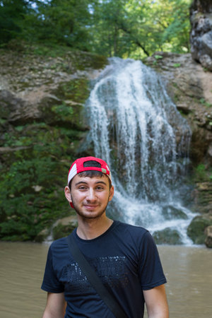 The young man smiles close upの写真素材