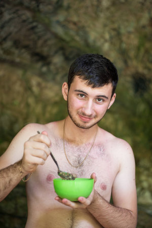 The young man smiles close upの写真素材