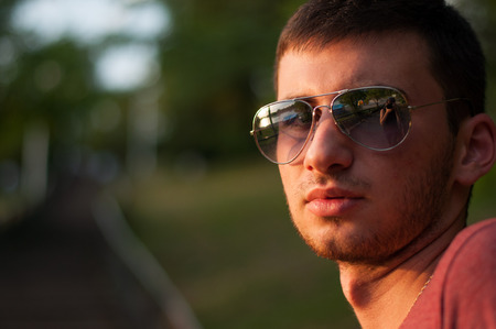 The young man smiles close upの写真素材