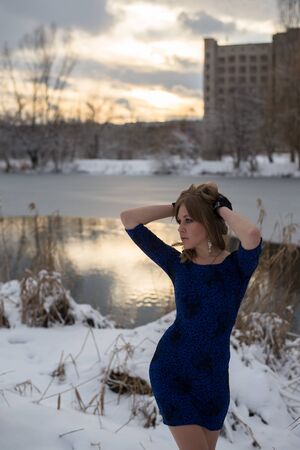 Young beautiful girl posing at outdoorの写真素材