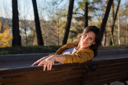 Young beautiful girl on a walk in the countryの写真素材