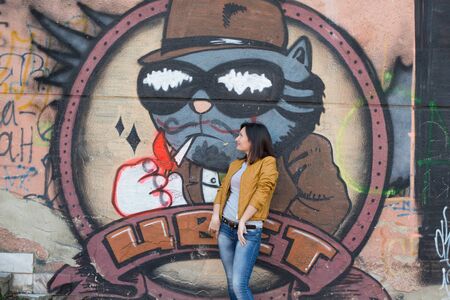 Young beautiful girl on a walk in the countryの写真素材