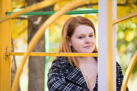 Young beautiful girl on a walk in the countryの写真素材