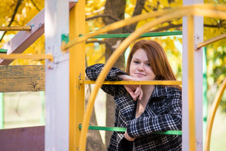 Young beautiful girl on a walk in the countryの写真素材