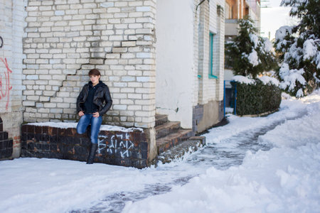 Young girl walking in the winterの写真素材