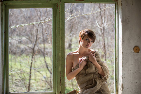 Young cute girl on walk in parkの写真素材