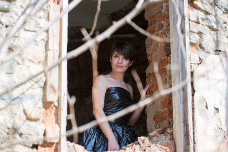 Young cute girl on walk in parkの写真素材