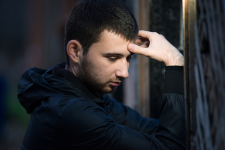 The young man smiles close upの写真素材