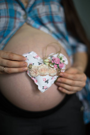 Portrait of a young beautiful pregnant girlの写真素材