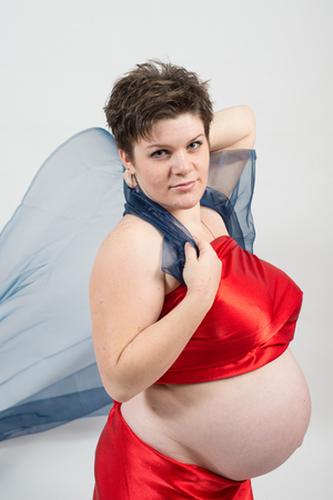 Portrait of a young beautiful pregnant girlの写真素材