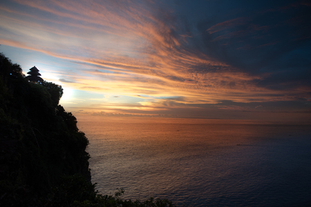 Uluwatu Temple sunset , Pura Luhur Uluwatu ,  rock cliff temple ,Bali Attractionsの写真素材