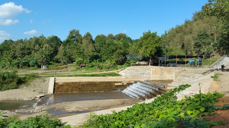Ladder dam in Nan province, Thailand. Clean and fresh water under the bright sky.の写真素材