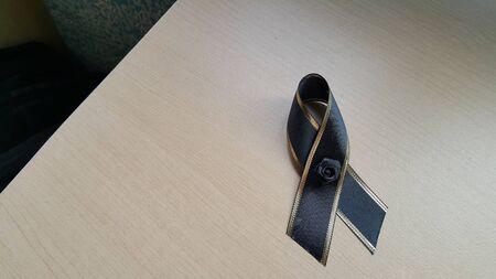 The black bow of the wooden table.の写真素材