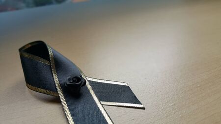 Single elegant black bow with the golden stripe.の写真素材