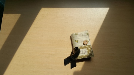 Black bow stack on the card holder.の写真素材