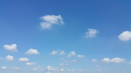 Blue sky and litle scatter clouds.の写真素材