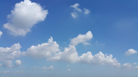 Blue sky and litle scatter clouds.の写真素材