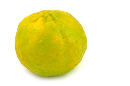 close up of whole orange isolated on white の写真素材
