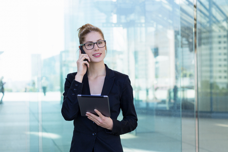 Businesswoman talking on mobile phoneの写真素材