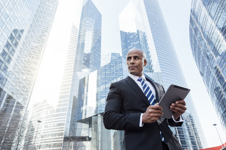 Afro american businessman using a Tablet pcの写真素材