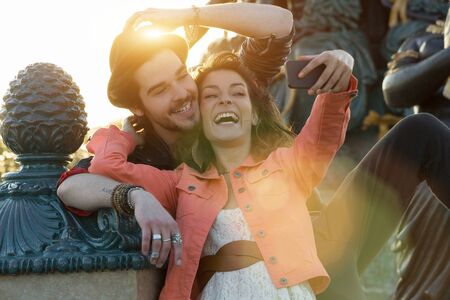 Young couple visiting parisの写真素材