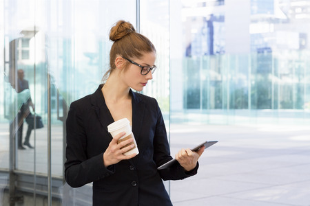 Businesswoman having a coffee breakの写真素材