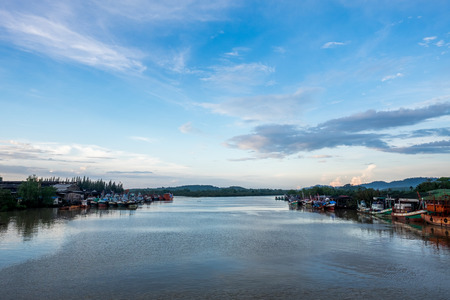 Beauty sky and Fishing boats on the rivers of Thailand.の写真素材